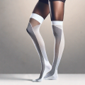 Compression stockings placed neatly on a stylish background